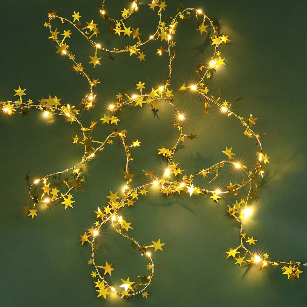 Гирлянда эл. нить росы медь "Золотые звезды", 5м, 50LED, шампань, пост.св., 3хАА СНОУ БУМ Гирлянда эл. нить росы медь "Золотые звезды", 5м, 50LED, шампань, пост.св., 3хАА СНОУ БУМ
